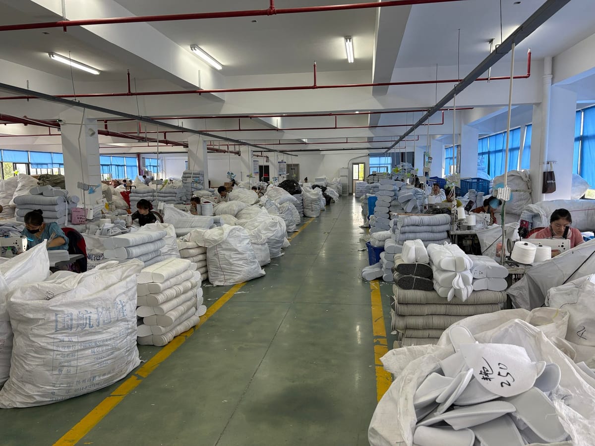 Slippers production line at the Yunastral factory — cutting and sewing workshop